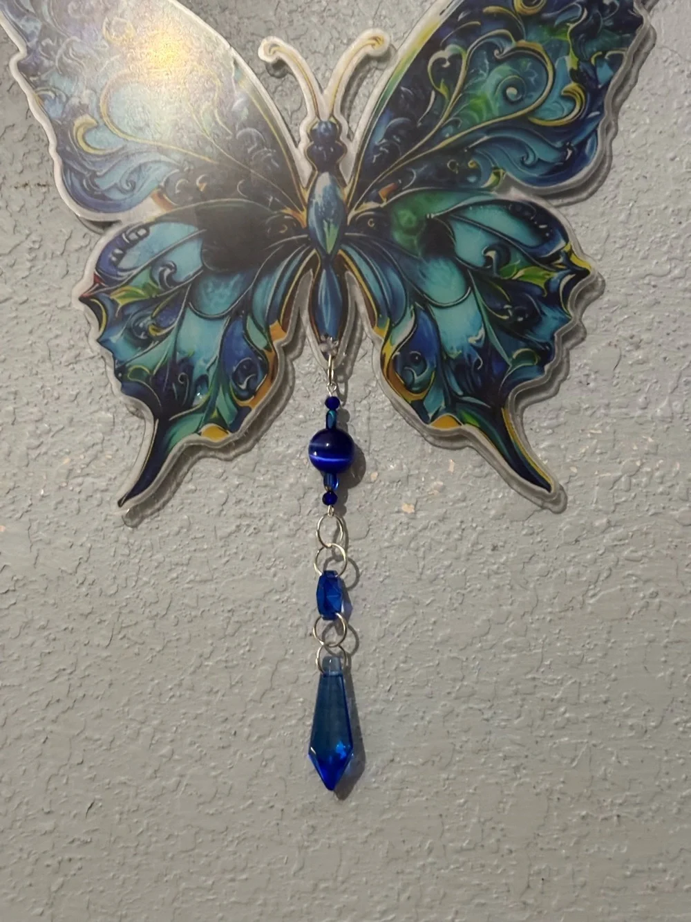 SOLD Blue Butterfly suncatcher